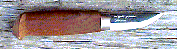 Click here for an enlarged image of the knife
and it's sheath.