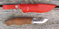 Click here for an enlarged image of the knife
and it's sheath.
