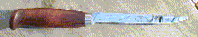 Click here for a larger image of the knife and it's sheath.
