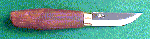 Click here for an enlarged image of the knife
and it's sheath.