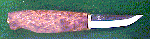 Click here for an enlarged image of the knife
and it's sheath.