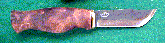Click here for an enlarged image of the knife
and it's sheath.