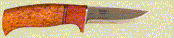 Click here for a larger image of the knife and it's sheath.