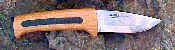 Click here for a larger image of the knife and it's sheath.