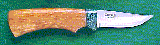 Click here for a larger image of the knife and it's sheath.