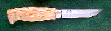 Click here for an enlarged image of the knife
and it's sheath.